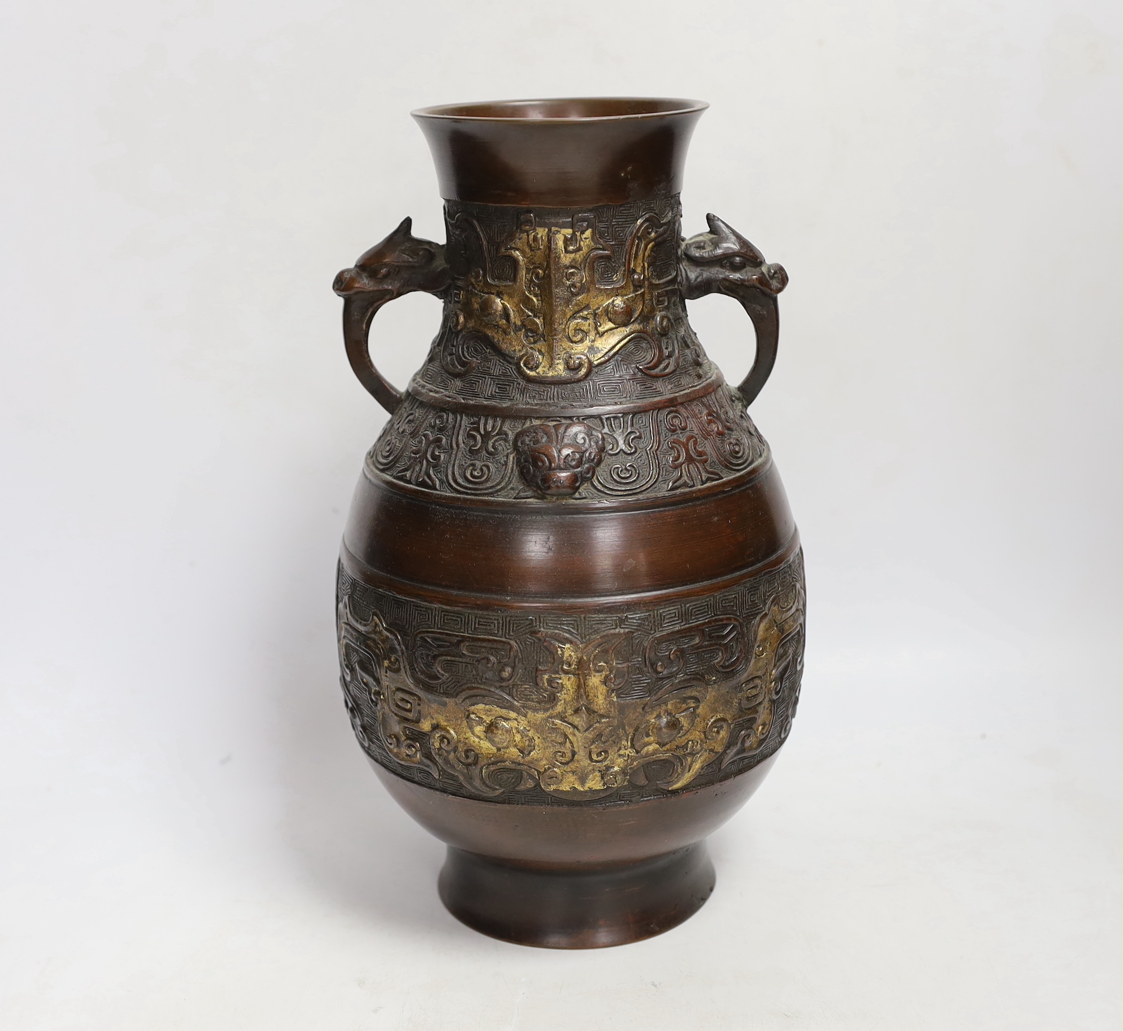 A Chinese gold splashed bronze vase, Qing period, 30cm